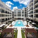 aerials of swimming pool in central courtyard at SLX apartments
